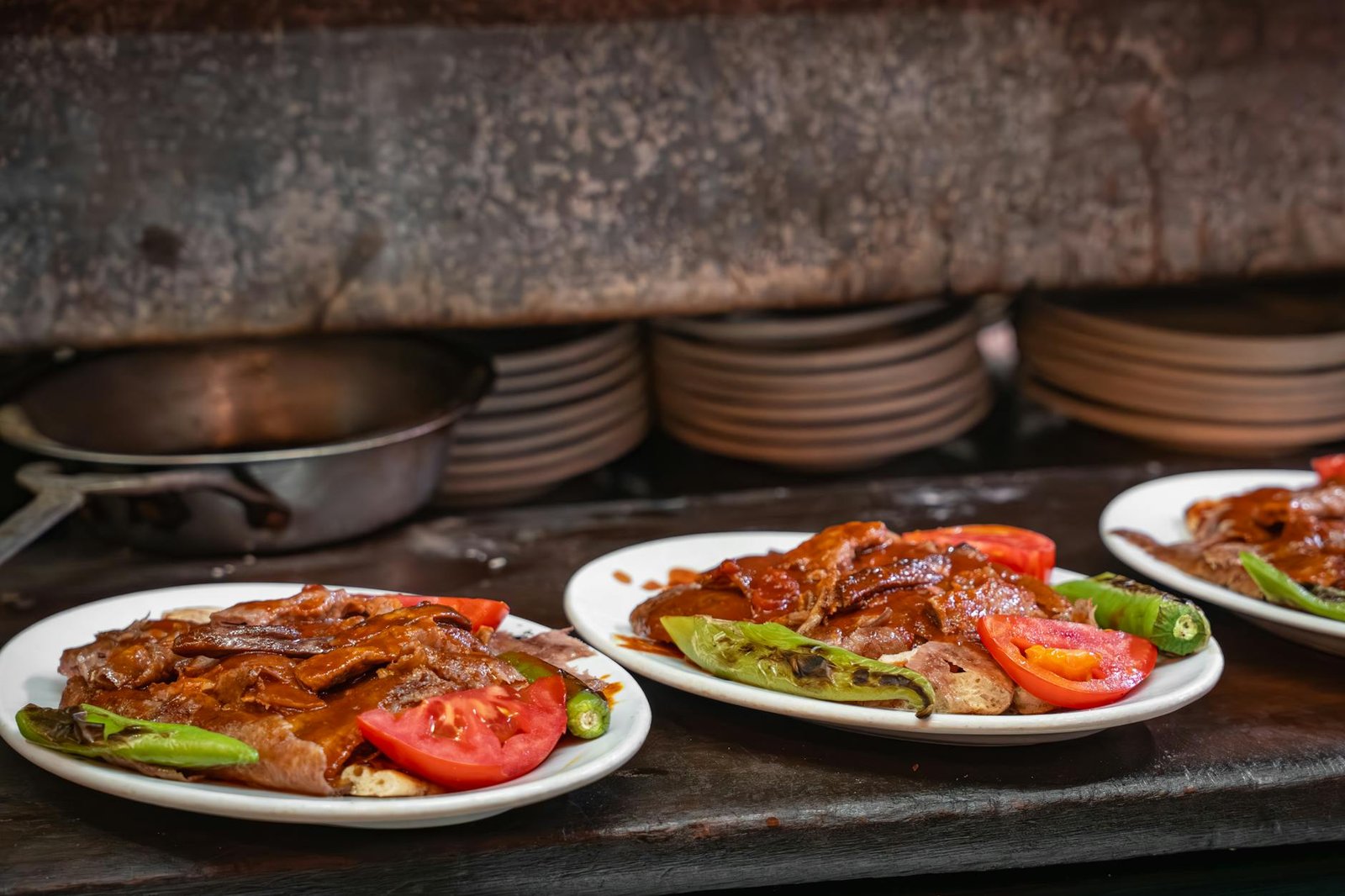 Savor the authentic taste of Turkish Doner Kebab with roasted vegetables in Bursa, Türkiye.