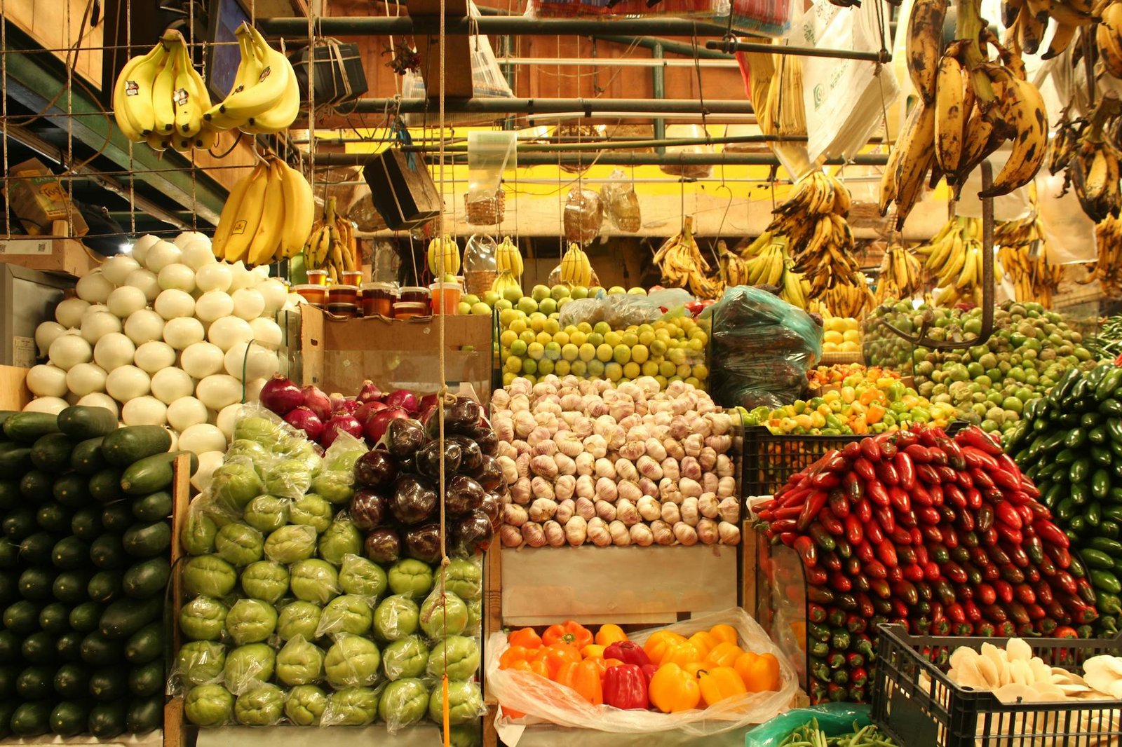 Vibrant display of fruits and vegetables in San Pedro Cholula market, Puebla, México.